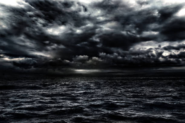 istock dark stormy sea with a dramatic cloudy sky 1347919746
