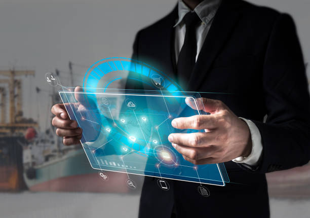 istock On a massive ship in the river background, a businessman holds a virtual interface panel of a global logistics network distribution and transportation, Smart logistics, and the future of transportation innovation. 1347921401