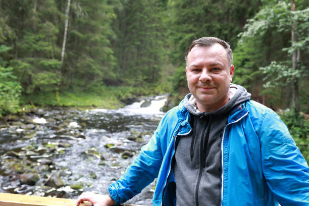 istock Man in park valley of waterfalls 1347921448