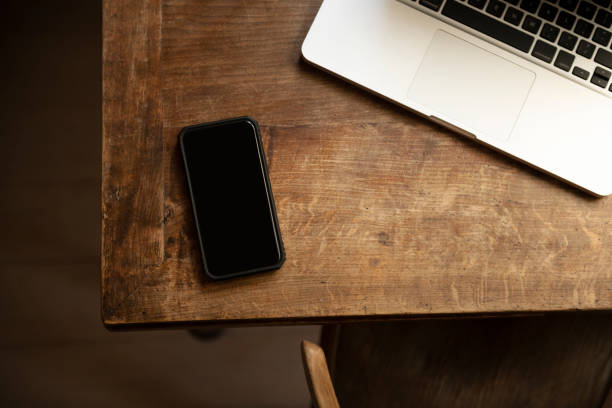 Top view Communicator Technology On Wood Table
