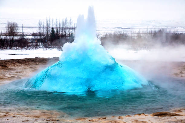 The famous Strokkur geyser erupting. Southwest Iceland.