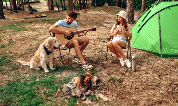 istock Family with dog in the forest 1347924574