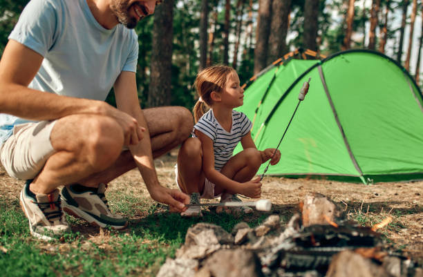 istock Family with dog in the forest 1347924598