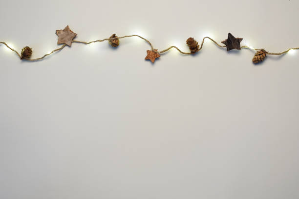 istock Christmas lights on the white background 1347930747