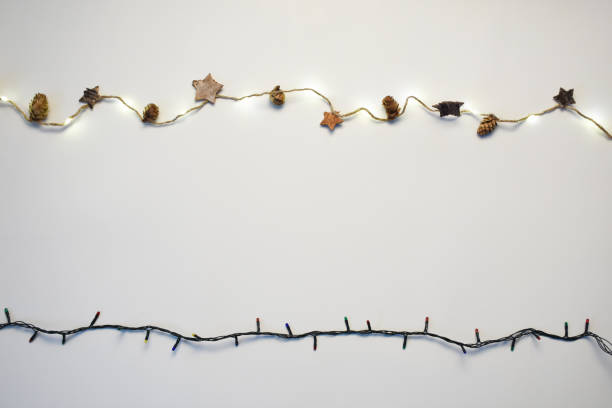 istock Christmas lights on the white background 1347930895