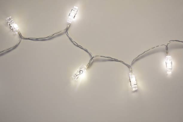 istock Christmas lights on the white background 1347931030
