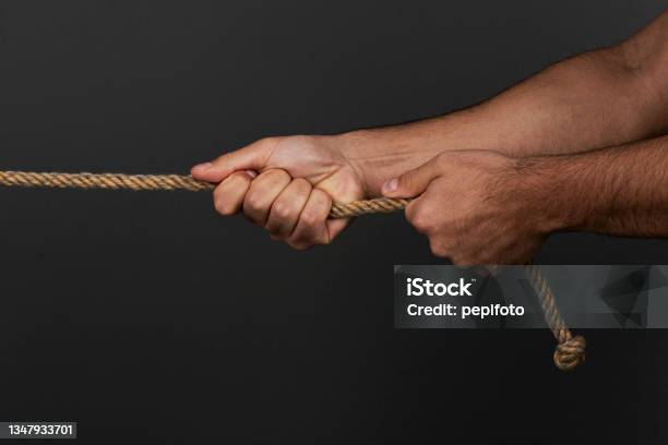 Simple Hand Pulling Rope Hands Pulling A Rope Stock Photo - Download Image Now - Adult, Adults ...