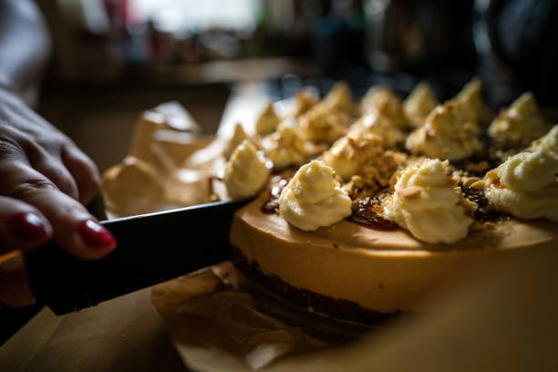 istock A knife cutting a Sweet toffee caramel cake 1347935421