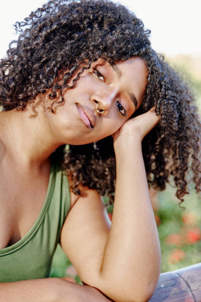 istock bored woman resting her head on her hand 1347939228