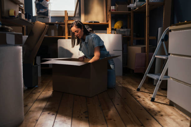 istock Caucasian Female Small Business Owner Working at her Storage Facility, Packing Goods for Shipping 1347940607