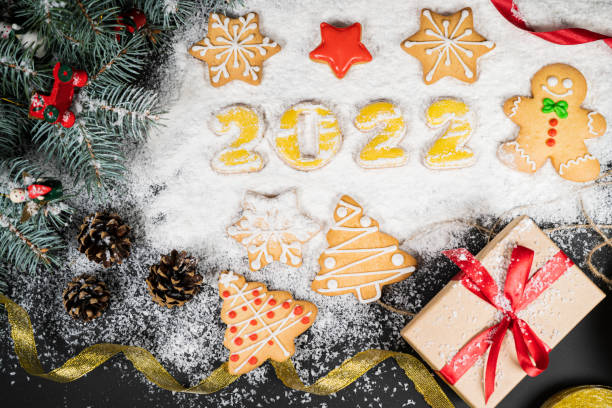istock New years 2022 holidays composition on snow background 1347942693