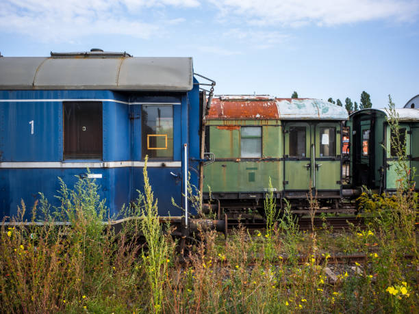 istock abandoned old passenger cars 1347945679