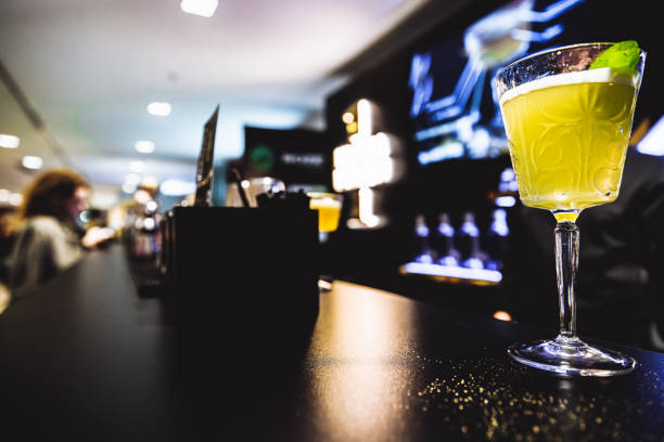 istock Yellow cocktail on the bar 1347955087