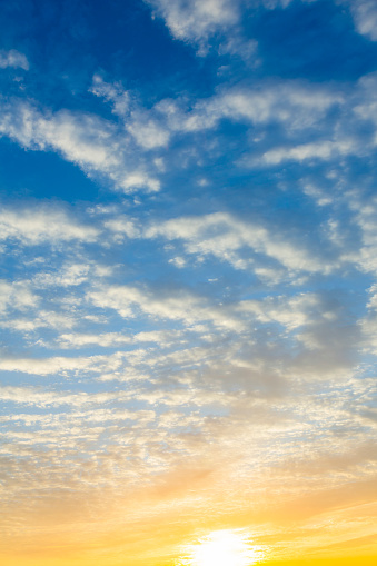 Beautiful morning or evening blue and orange sky taken at the sea is used as natural blackground texture