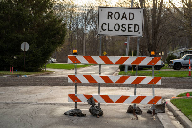 istock Street Intersection Blocked by Road Closed Sign 1347971813