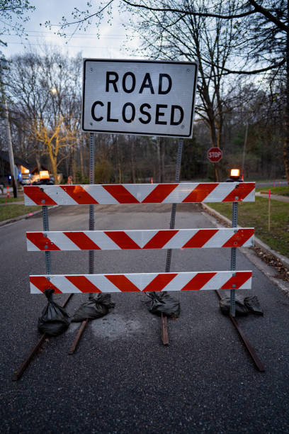 istock Street Intersection Blocked by Road Closed Sign 1347971883