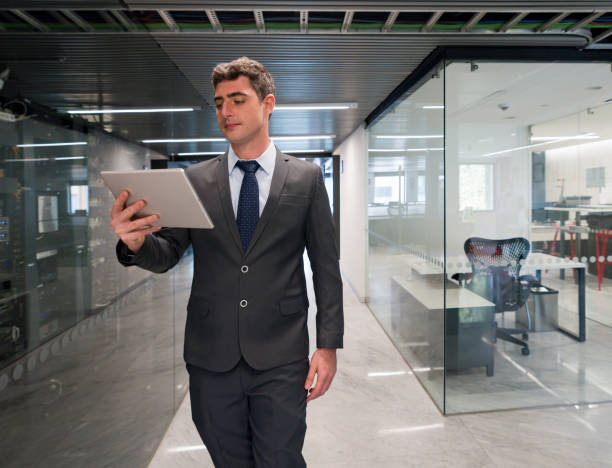 istock IT technician working in the server room of a corporate office building 1347972925