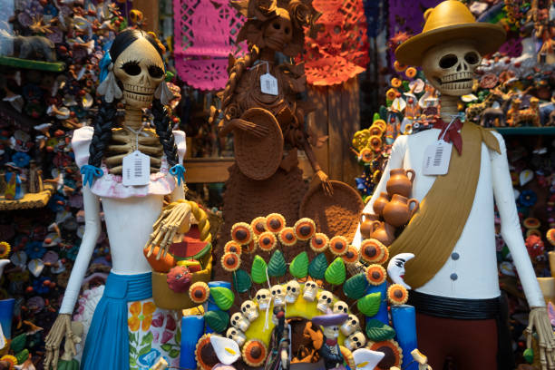 istock Day Of The Death figures on display in a store 1347974663