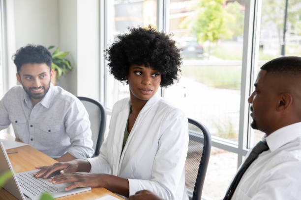 istock Colleagues in boardroom meeting 1347977575