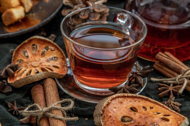 istock Hot bael fruit tea with bark of bael fruit. 1347978001
