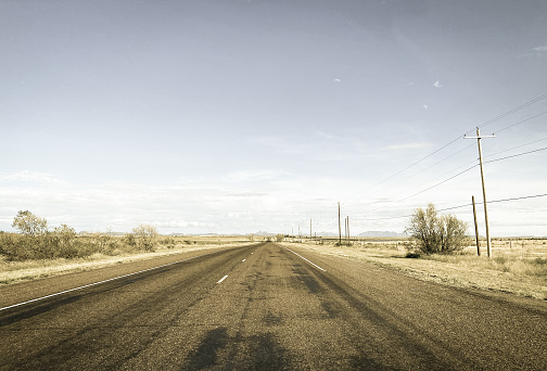 Empty Country Road Into Marfa, TX. Shot in October.