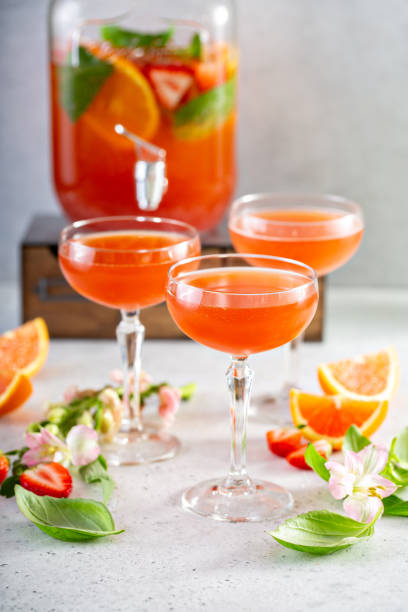 Strawberry and basil sparkling punch Strawberry, orange and basil sparkling punch, spring cocktail punch drink stock pictures, royalty-free photos & images