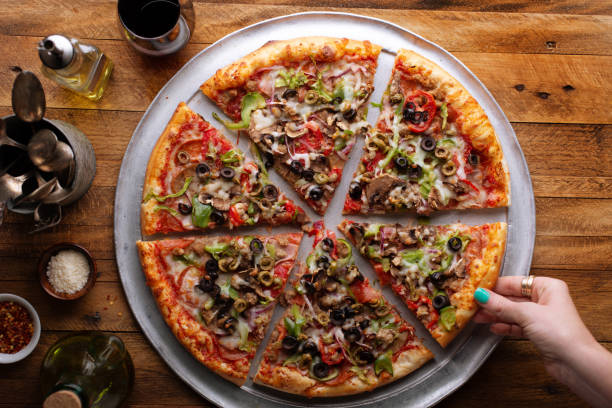 istock Vegetarian pizza with vegetables and mushrooms 1347984674