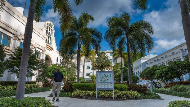 Jackson Health System Miami, USA - October 21, 2021: View of Sylvester Comprehensive Cancer Center at Jackson Memorial Hospital facilities in a sunny morning. Jackson Health System in Miami, Florida is a nonprofit academic medical system governed by the Public Health Trust which ensures that all residents of Miami-Dade County receive a single high standard of care regardless of their ability to pay. support usa florida politics stock pictures, royalty-free photos & images