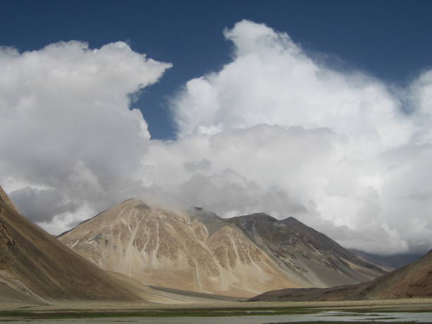 Leh - Mountain Peak with Clouds stock photo