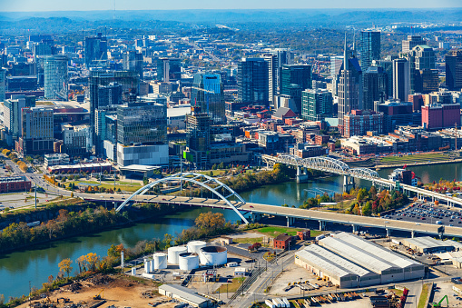 The skyline of Nashville, Tennessee along the banks of the Cumberland River from an altitude of about 1000 feet.