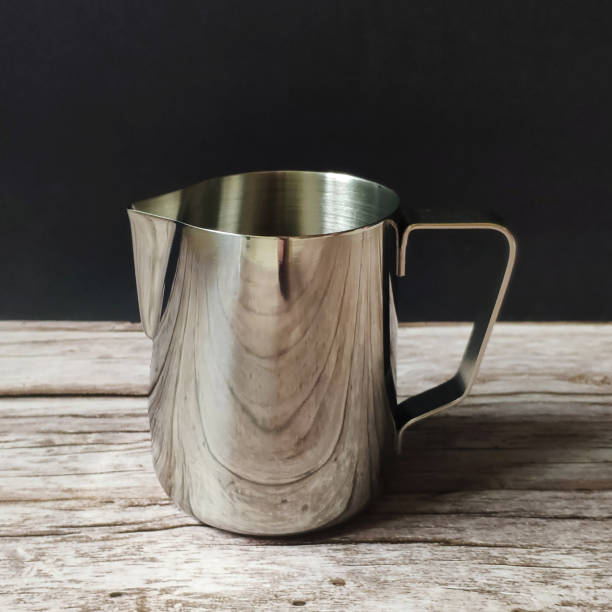 Stainless Steel Milk Pitcher with black color background