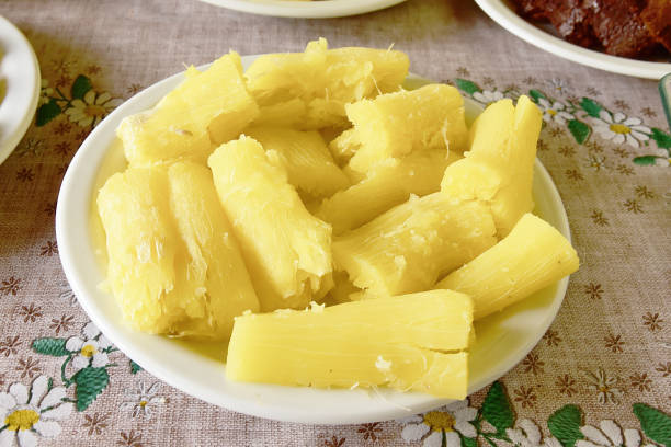 Boiled cassava or tapioca on a plate stock photo