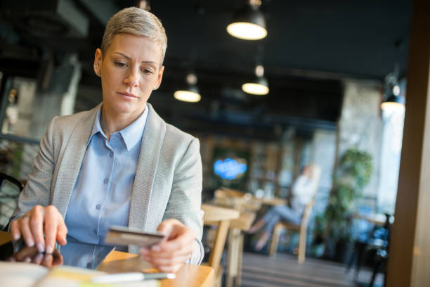 istock Businesswoman using credit card to pay online using digital tablet. 1347993226