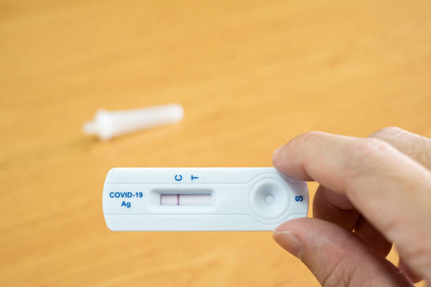 istock Selective focus at antigen test kit or Covid rapid test holding in human hand with negative result. medical tool for quick examine Covid-19 infected for personal use at home. 1347994098