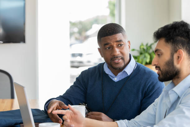 A man talking to a lender provider