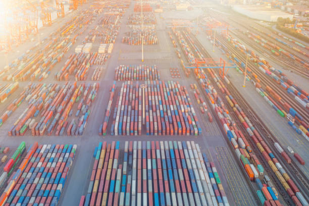 istock Freight trains from containers at a terminal. Aerial view of container terminal with containers and container bridge. 1348001054