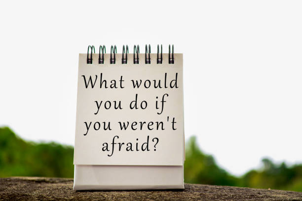 istock Motivational and inspirational quote with phrase on white stand paper 1348001096