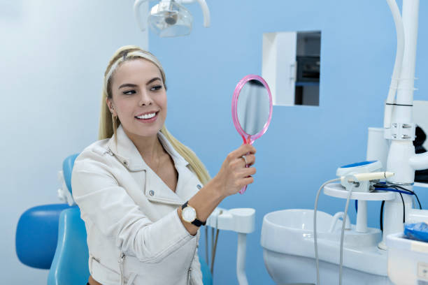 istock Satisfied patient at the dentist. 1348002812