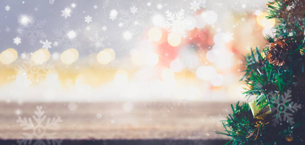 istock Wooden table and christmas lights background 1348005410