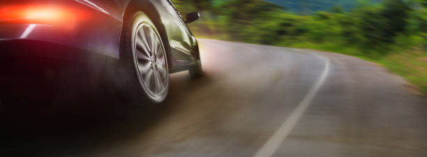 istock Sport car wheel drifting on road 1348005432
