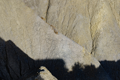Natural stone rock background with shadow