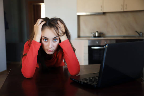 istock Tired woman working from home 1348007682
