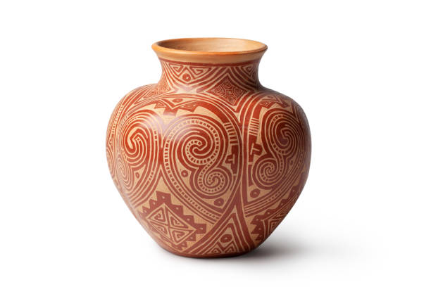 Handmade terracotta vase. The designs are ethnic in origin.