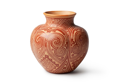 Handmade clay pitcher isolated on white background. Photo with clipping path. Handicraft products of Indigenous tribes in Brazil.