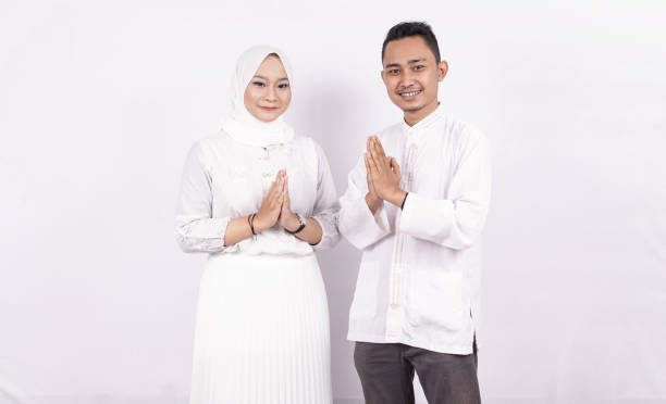 istock Asian moslem couple OK gesture isolated 1348009346