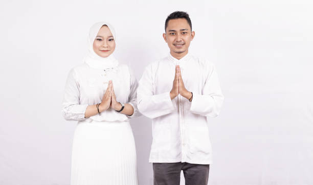 istock Asian moslem couple OK gesture isolated 1348009360