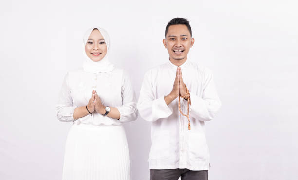 istock Asian moslem couple OK gesture isolated 1348009379