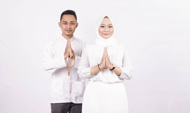 istock Asian moslem couple OK gesture isolated 1348009392