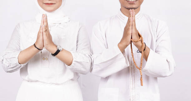 istock Asian moslem couple OK gesture isolated 1348009414
