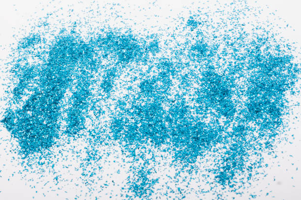 istock blue sequins scattered on a white background, the concept of a festive background 1348011439